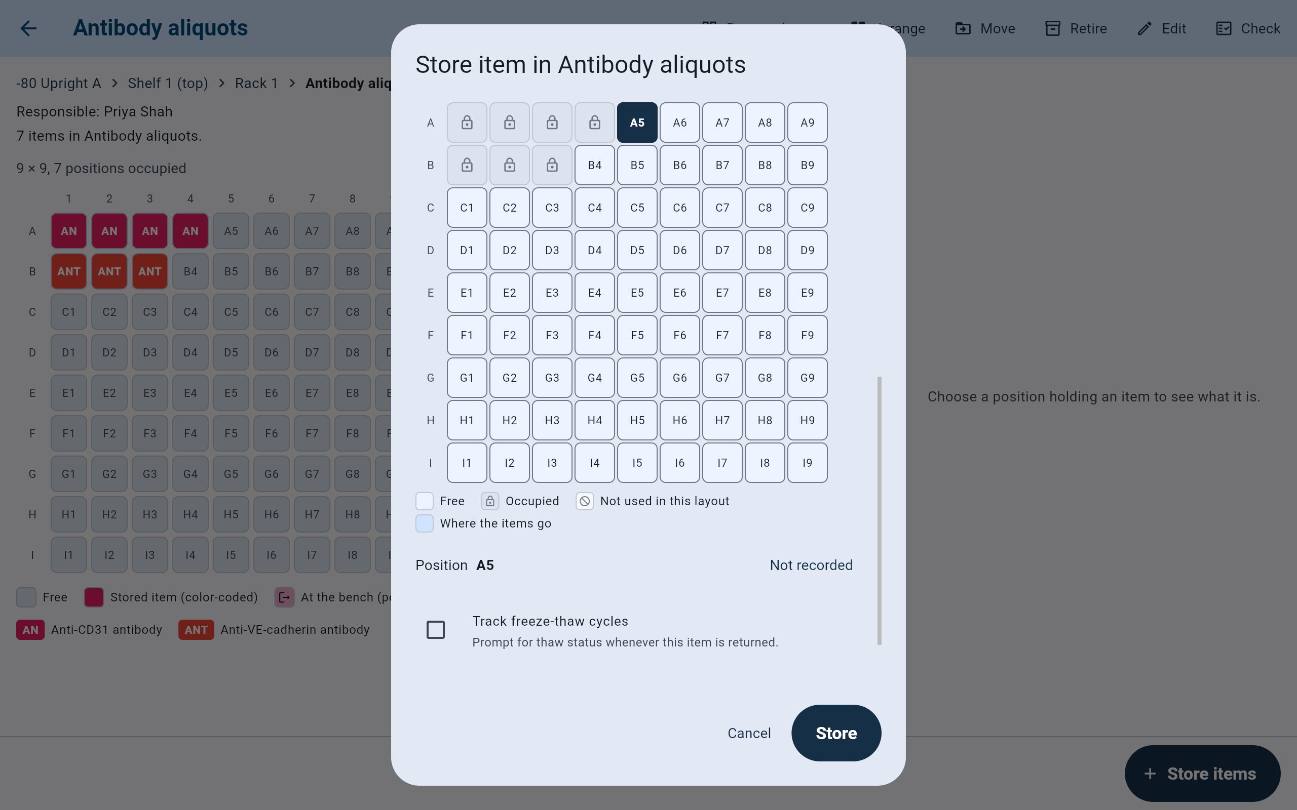 Lower part of the store form: a 9 by 9 grid with A1 to A4 and B1 to B3 occupied and A5 chosen, the legend Free, Occupied, Not used in this layout and Where the items go, Position A5 with Not recorded, Track freeze-thaw cycles, and Store.