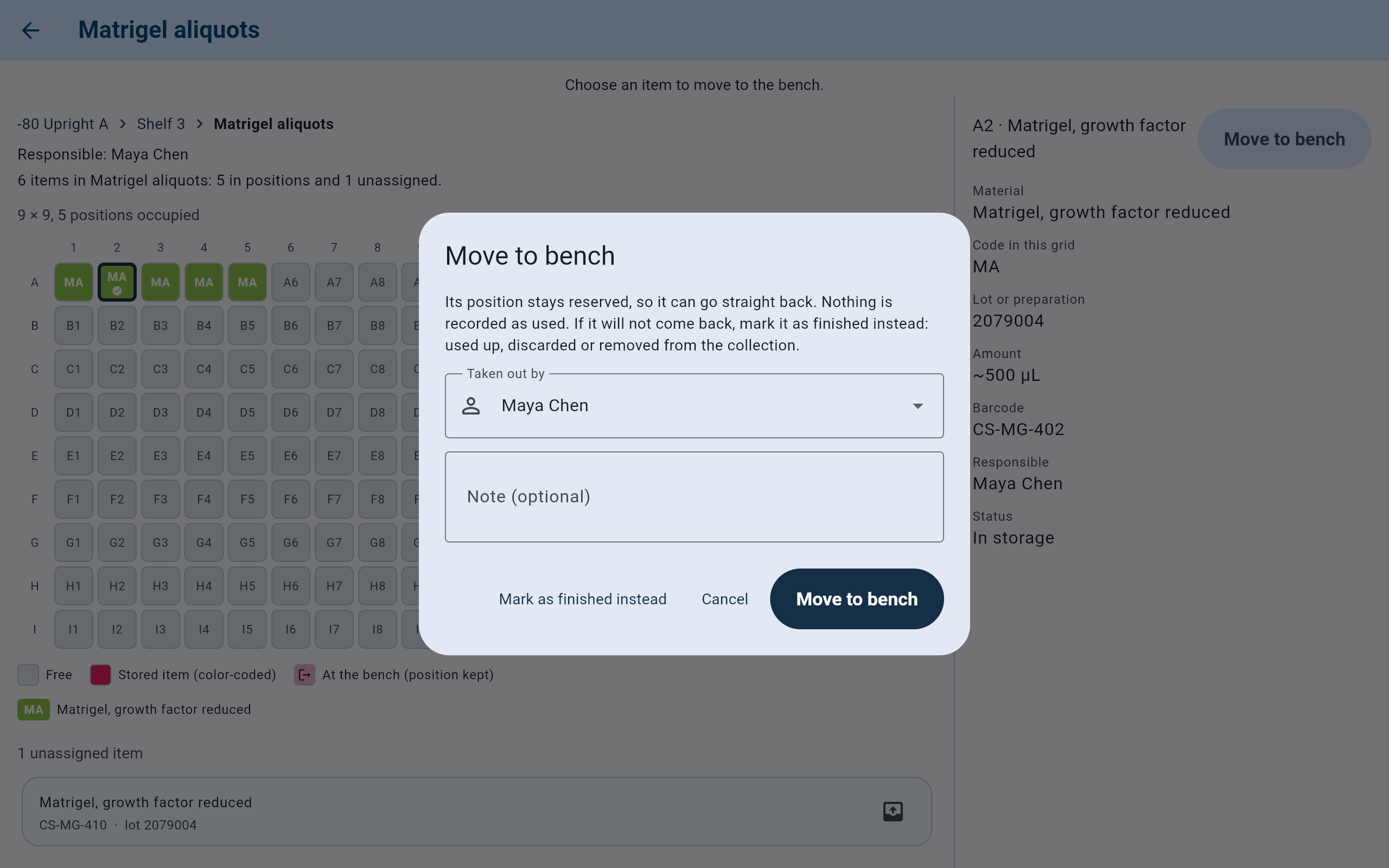 CryoIndex Move to bench dialog over the Matrigel aliquots box, explaining that the position stays reserved and nothing is recorded as used, with Taken out by set to Maya Chen, a Note (optional) field, and the buttons Mark as finished instead, Cancel and Move to bench.